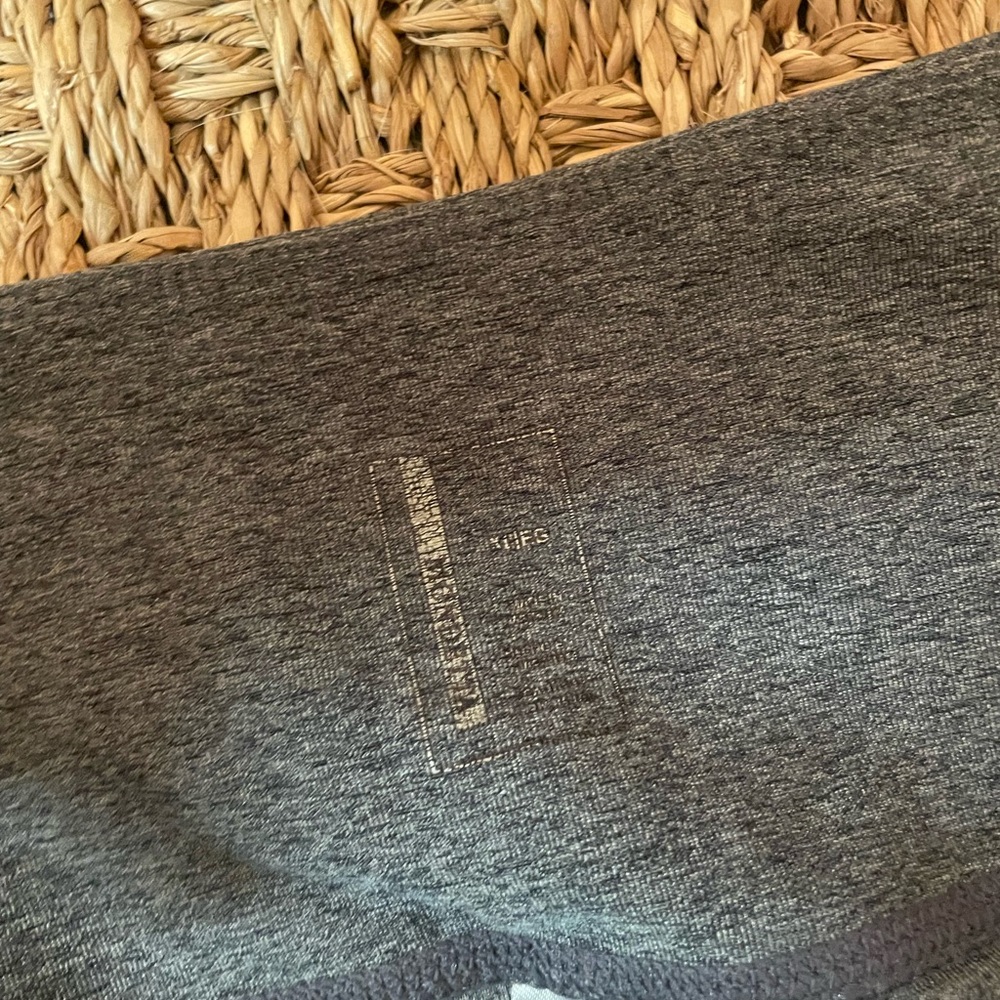 grey leggings with mesh on bottom and pockets
